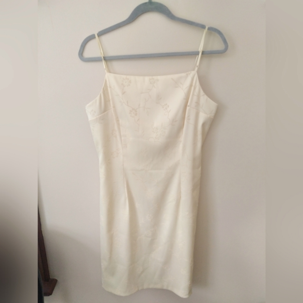 Very pale yellow spaghetti strapped dress